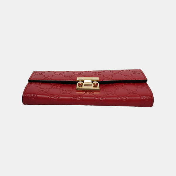 Authenticated pre-owned Padlock Monogram Calfskin Red - Top Handle Bag at Looply
