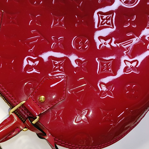 Authenticated pre-owned Alma PM Monogram Calfskin Red - Top Handle Bag at Looply