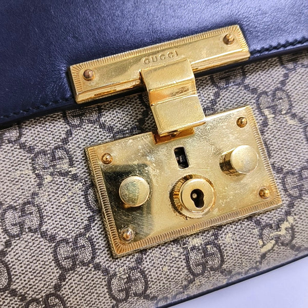 Authenticated pre-owned Padlock Small Monogram Coated Canvas Multicolor - Shoulder Bag at Looply