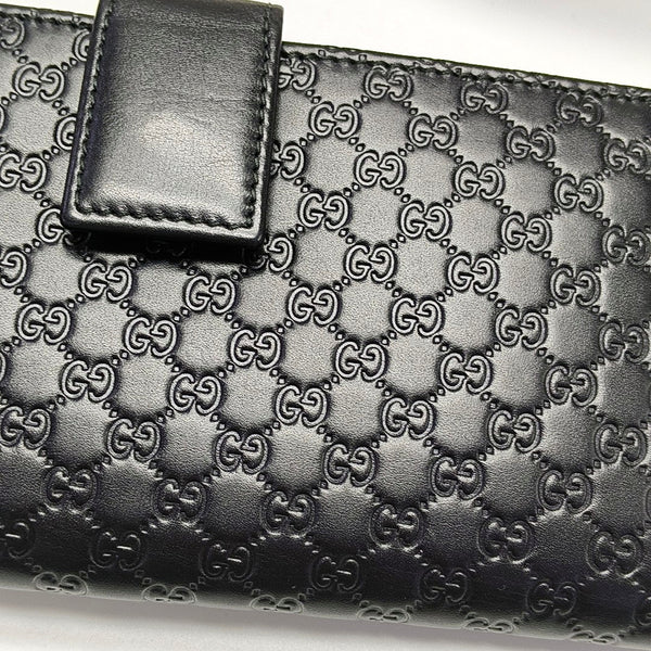 Authenticated pre-owned Microguccissima Monogram Calfskin Black Wallet - Wallet at Looply