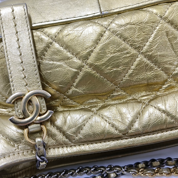 Authenticated pre-owned Gabrielle Small Quilted Calfskin Gold - Crossbody Bag at Looply