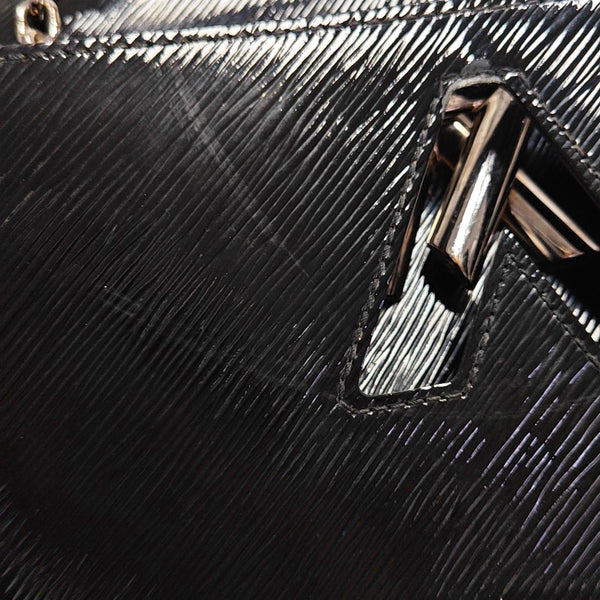 Authenticated pre-owned Twist MM Epi Black - Shoulder Bag at Looply