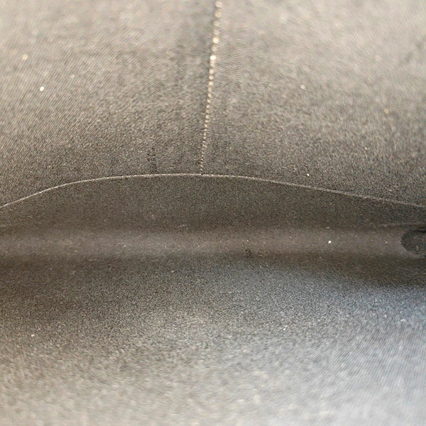 Authenticated pre-owned Karlito Calfskin Black - Clutch at Looply
