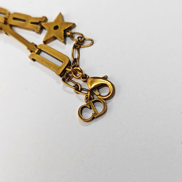 Authenticated pre-owned J'ADIOR Logo Gold-Tone Metal Bracelet - Bracelet at Looply