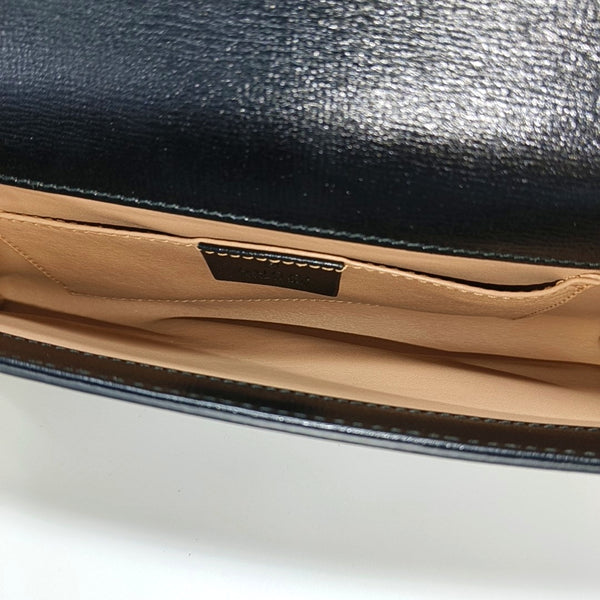 Authenticated pre-owned GG Marmont Calfskin Black - Clutch at Looply
