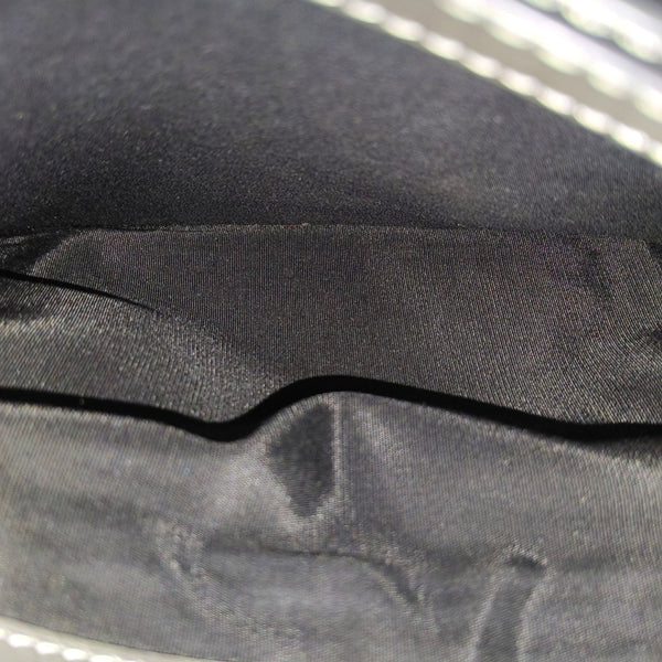 Authenticated pre-owned Saddle Leather Gray - Clutch at Looply
