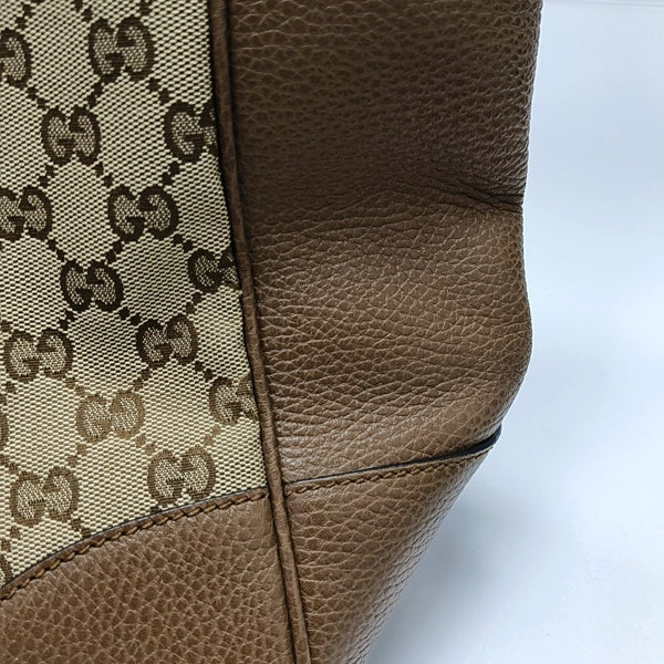 Authenticated pre-owned Bree Small Monogram Canvas Beige - Top Handle Bag at Looply