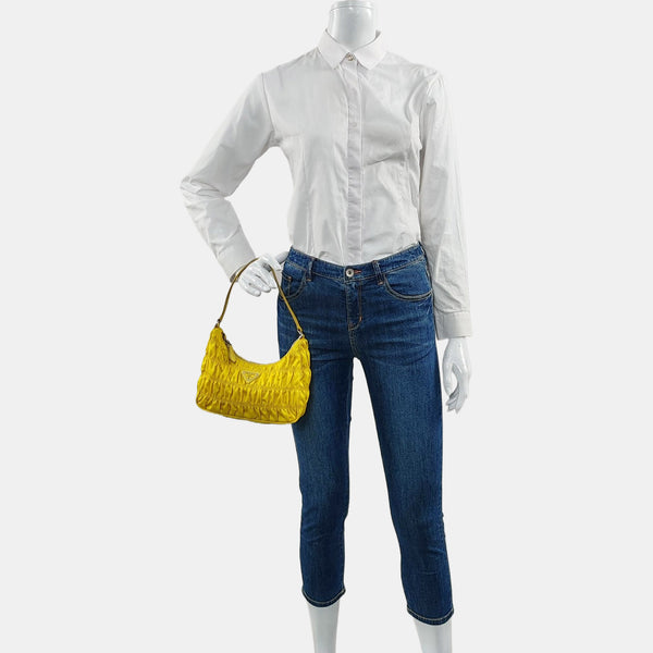 Authenticated pre-owned Re-edition2005 Mini Nylon Yellow - Top Handle Bag at Looply