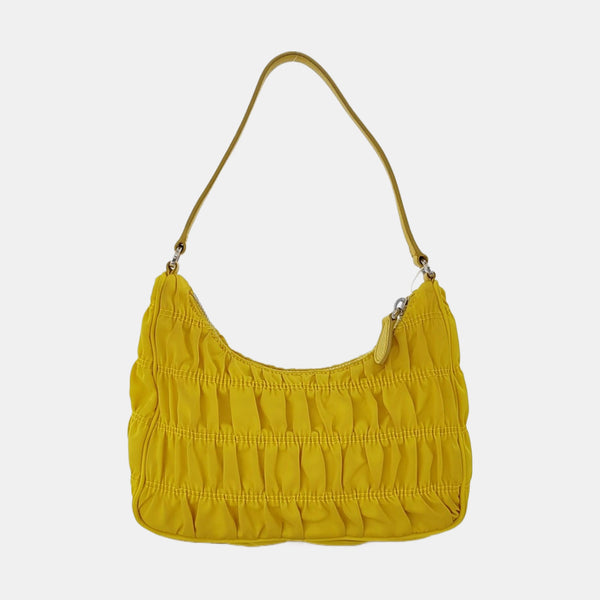 Authenticated pre-owned Re-edition2005 Mini Nylon Yellow - Top Handle Bag at Looply