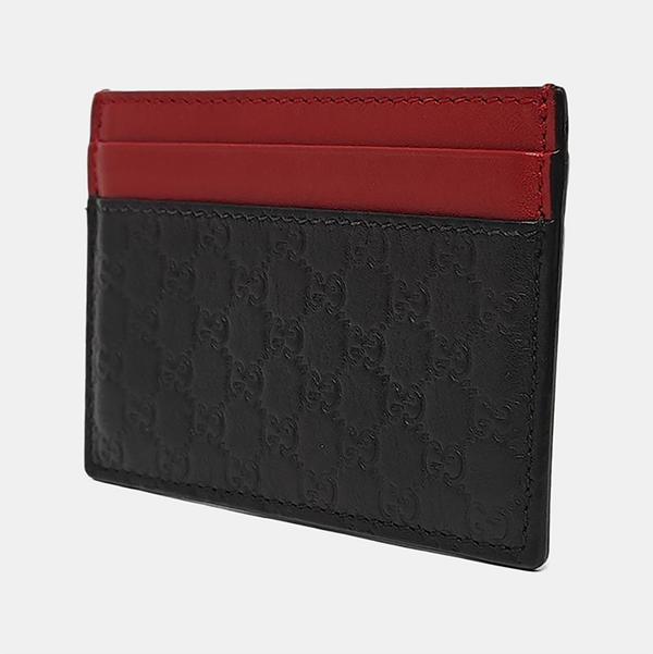 Authenticated pre-owned Microguccissima Monogram Calfskin Black Card Holder - Card Holder at Looply