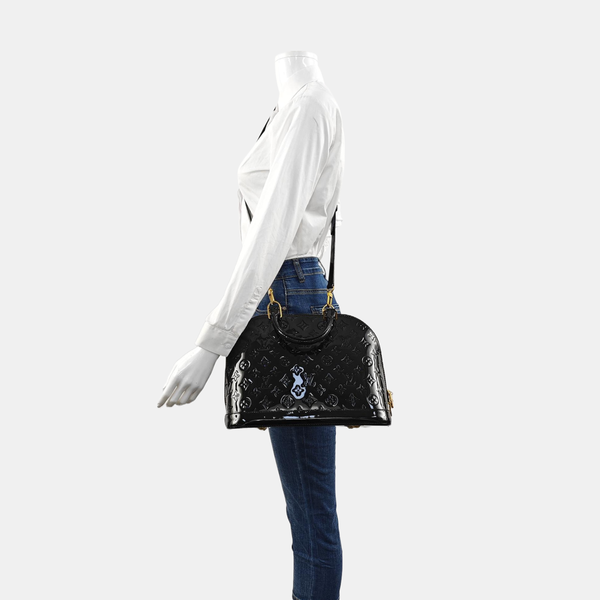 Authenticated pre-owned Alma Monogram Patent Leather Black - Shoulder Bag at Looply