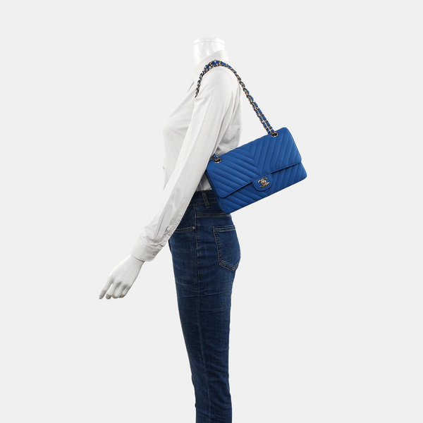 Authenticated pre-owned Classic Flap Medium Chevron Grained Calfskin Blue - Shoulder Bag at Looply