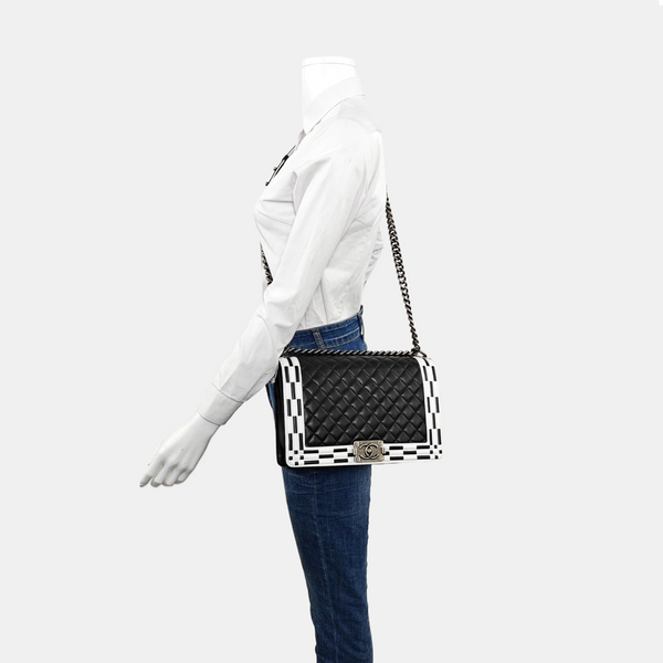 Authenticated pre-owned Boy Chanel Large Quilted Calfskin Black - Crossbody Bag at Looply