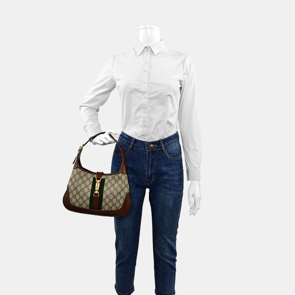 Authenticated pre-owned Jackie 1961 Small Monogram Coated Canvas Beige - Top Handle Bag at Looply