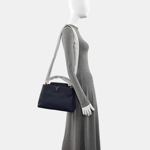 Authenticated pre-owned Capucines MM Calfskin Blue - Shoulder Bag at Looply