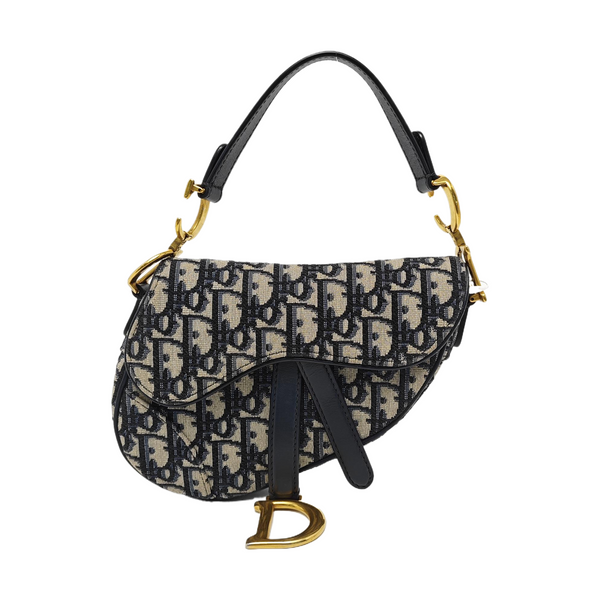 Authenticated pre-owned  Saddle Mini Monogram Canvas Blue - Top Handle Bag at Looply