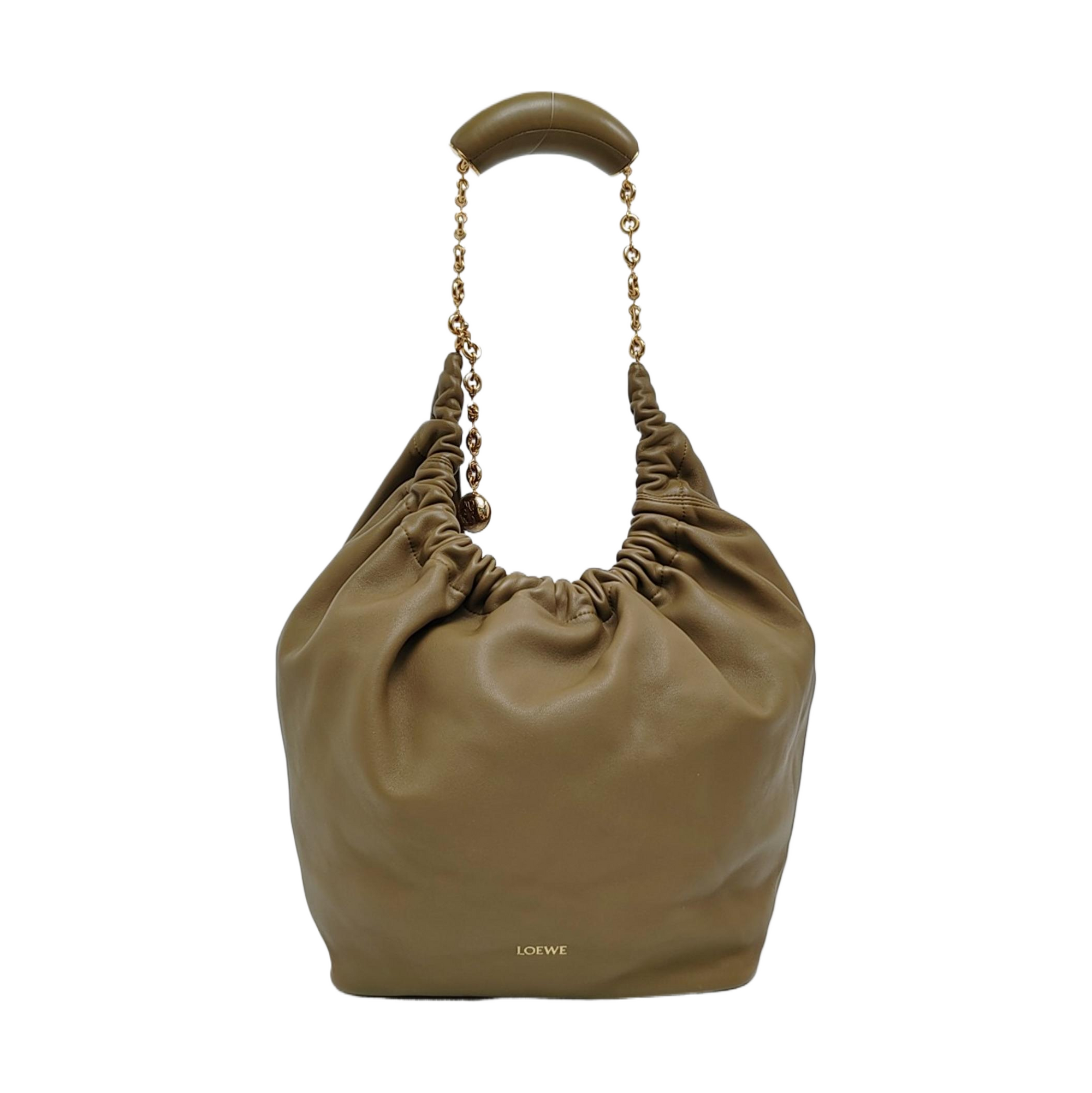 Bolsa Squeeze pequeña de piel de cordero color verde