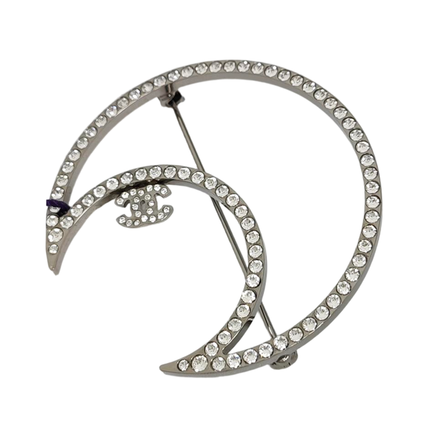 Broche de plata metálica
