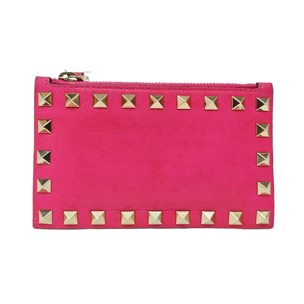 Authenticated pre-owned  Rockstud Calfskin Pink - Clutch at Looply