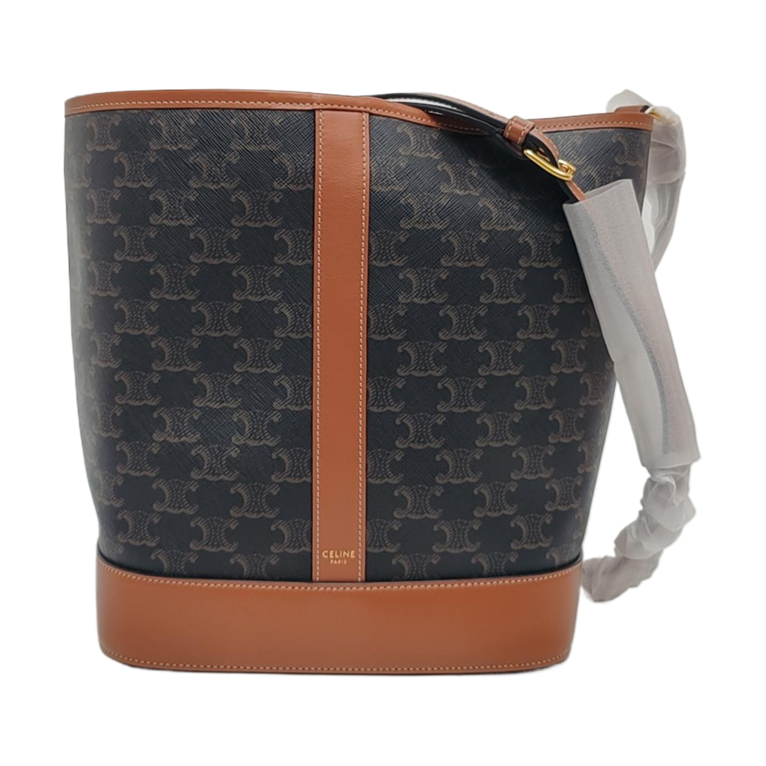 Authenticated pre-owned  TRIOMPHE CANVAS Medium Coated Canvas Yellow - Bucket Bag at Looply