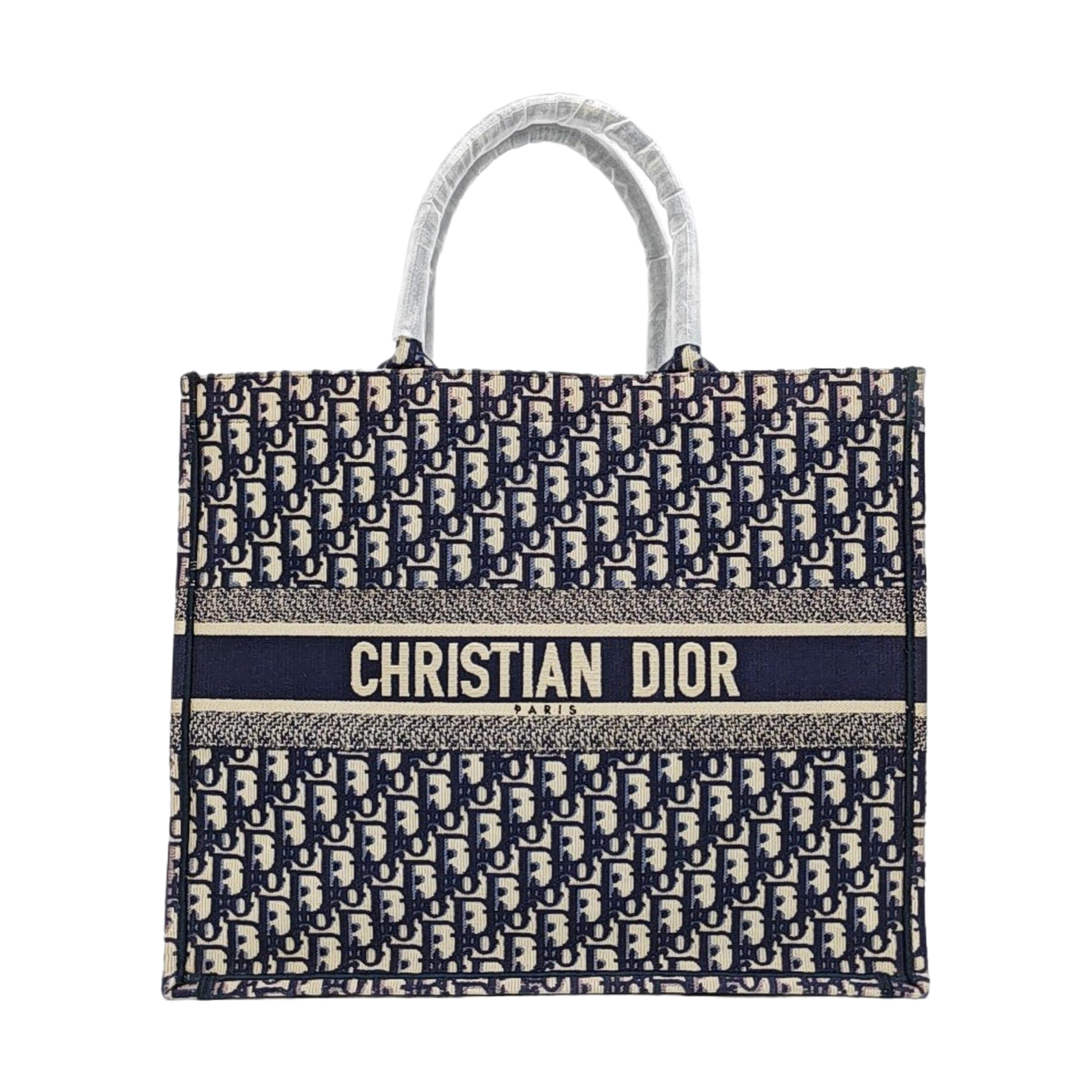 Authenticated pre-owned  Book Tote Large Monogram Canvas Beige - Tote Bag at Looply