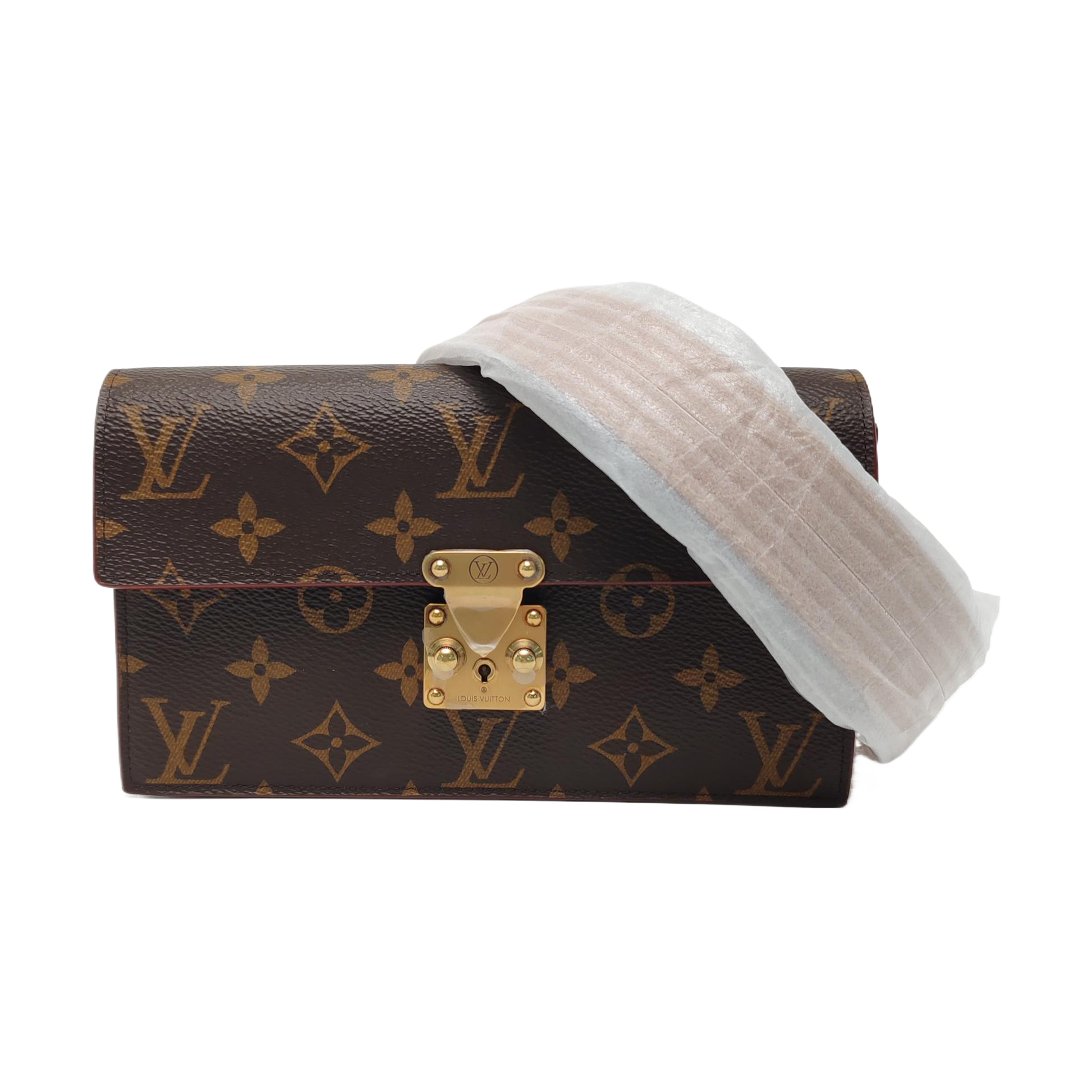S LOCK Monogram Coated Canvas Brown