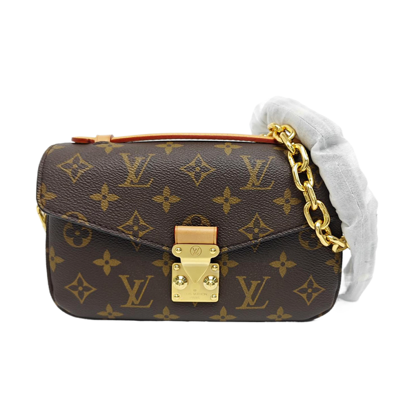 MÉTIS EAST WEST Monogram Coated Canvas Brown