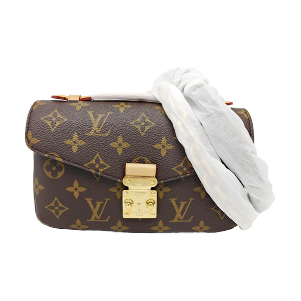 MÉTIS EAST WEST Monogram Coated Canvas Brown