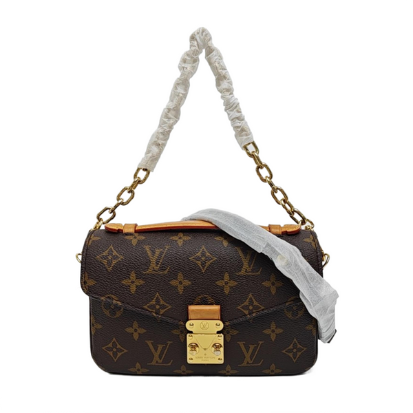 MÉTIS EAST WEST Monogram Coated Canvas Brown