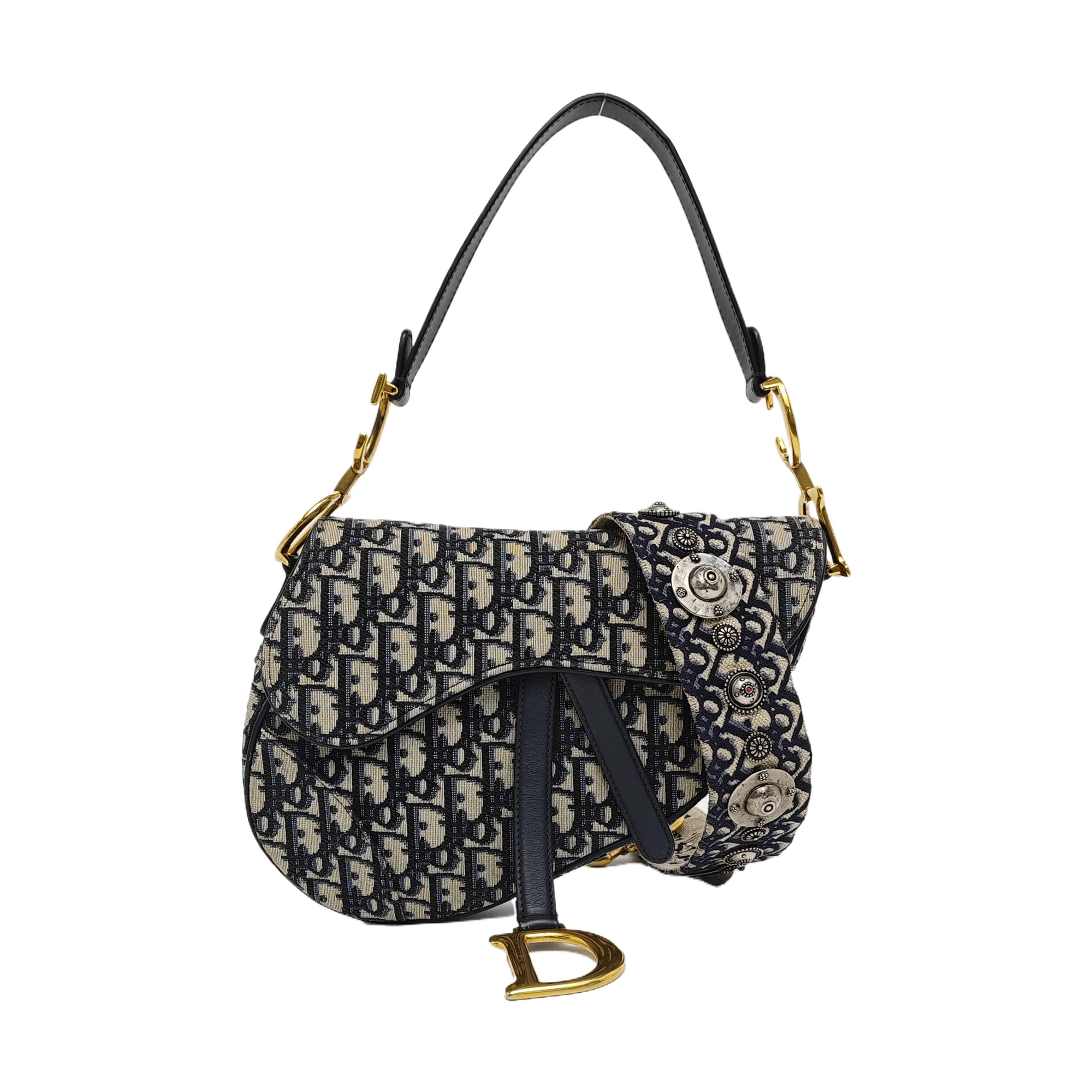 Authenticated pre-owned  Saddle Medium Monogram Canvas Blue - Shoulder Bag at Looply