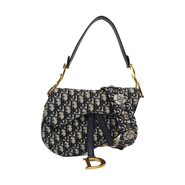 Authenticated pre-owned  Saddle Medium Monogram Canvas Blue - Shoulder Bag at Looply
