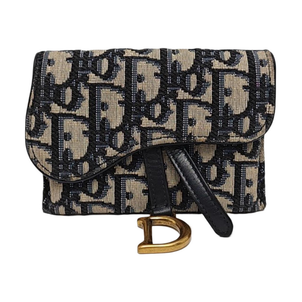 Authenticated pre-owned  Saddle Oblique Canvas Blue - Clutch at Looply