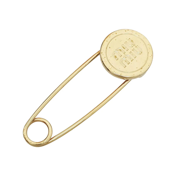 Broche de oro de metal