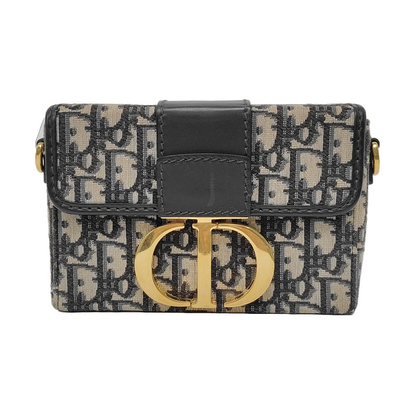 Authenticated pre-owned  30 Montaigne Oblique Canvas Blue - Clutch at Looply