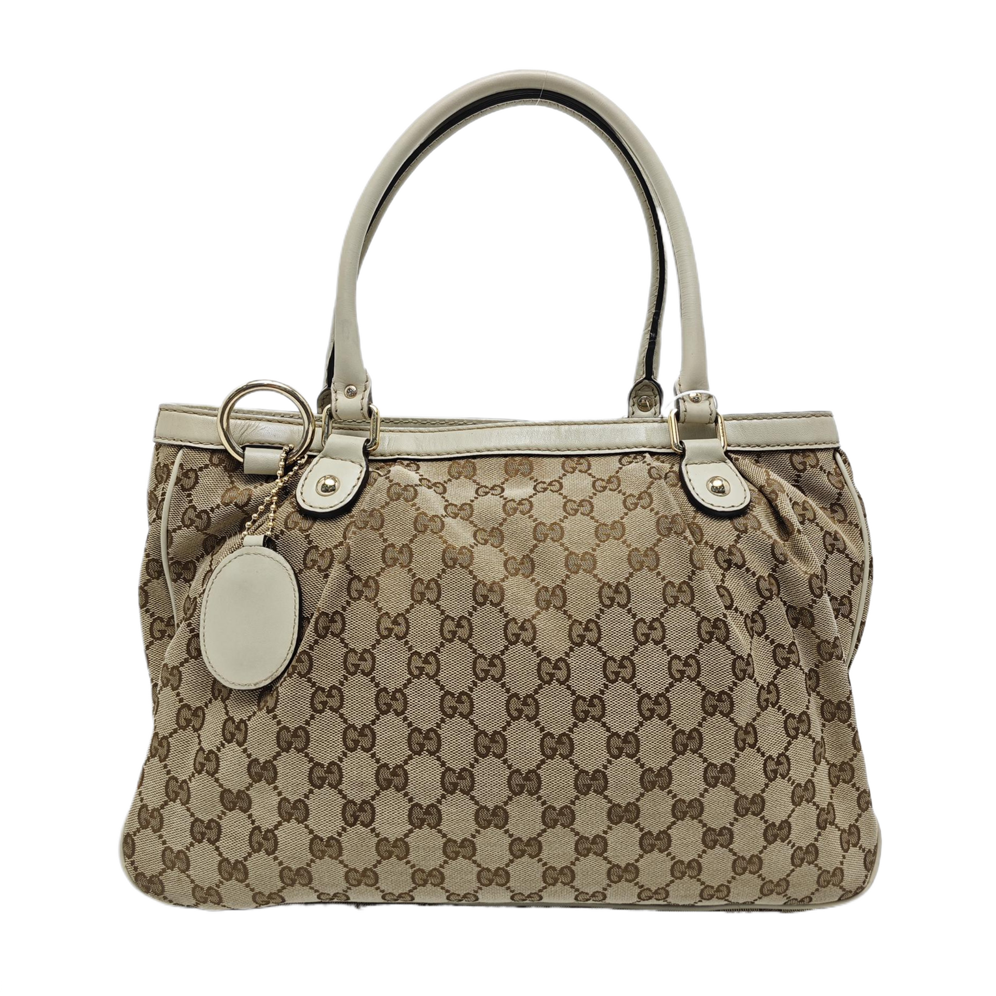 Sukey Monogram Canvas Brown