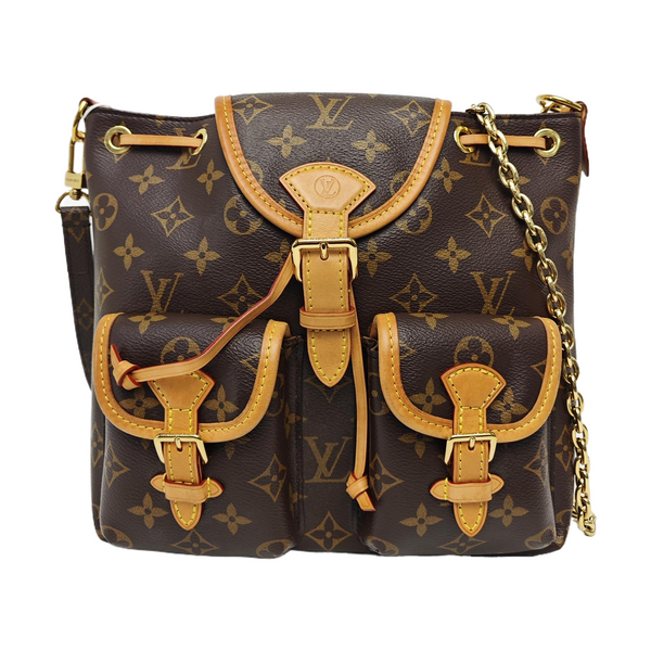 EXCURSION PM Monogram Coated Canvas Brown