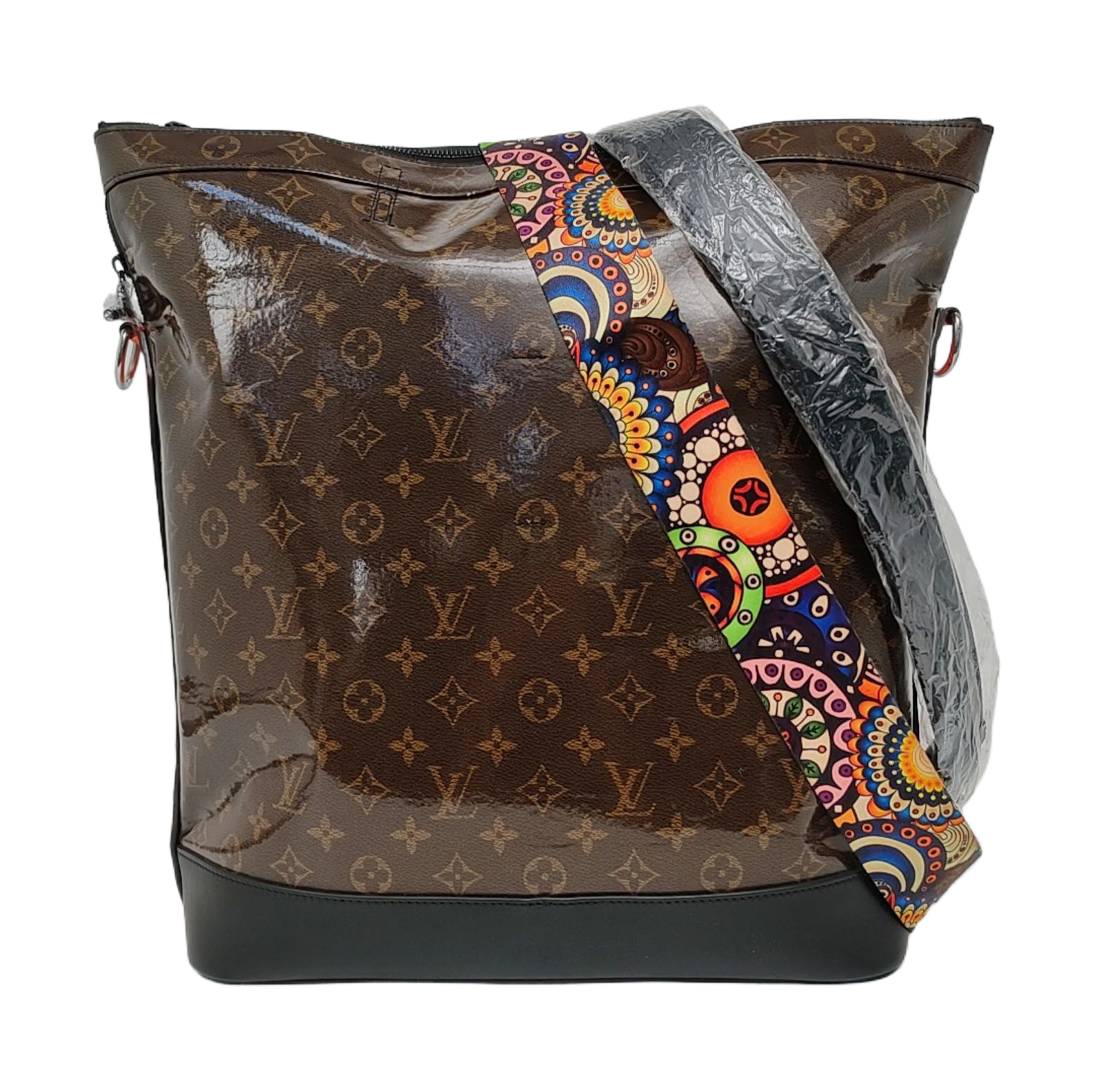 EXPLORER Monogram Coated Canvas Brown