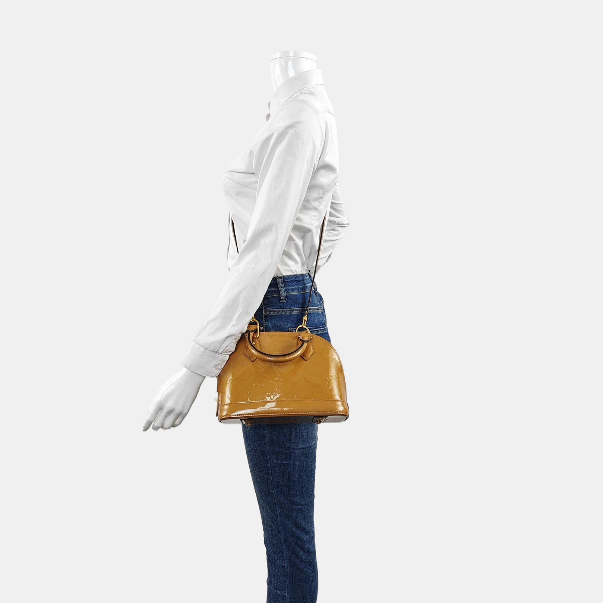 Authenticated pre-owned  ALMA Monogram Patent Leather Yellow - Shoulder Bag at Looply