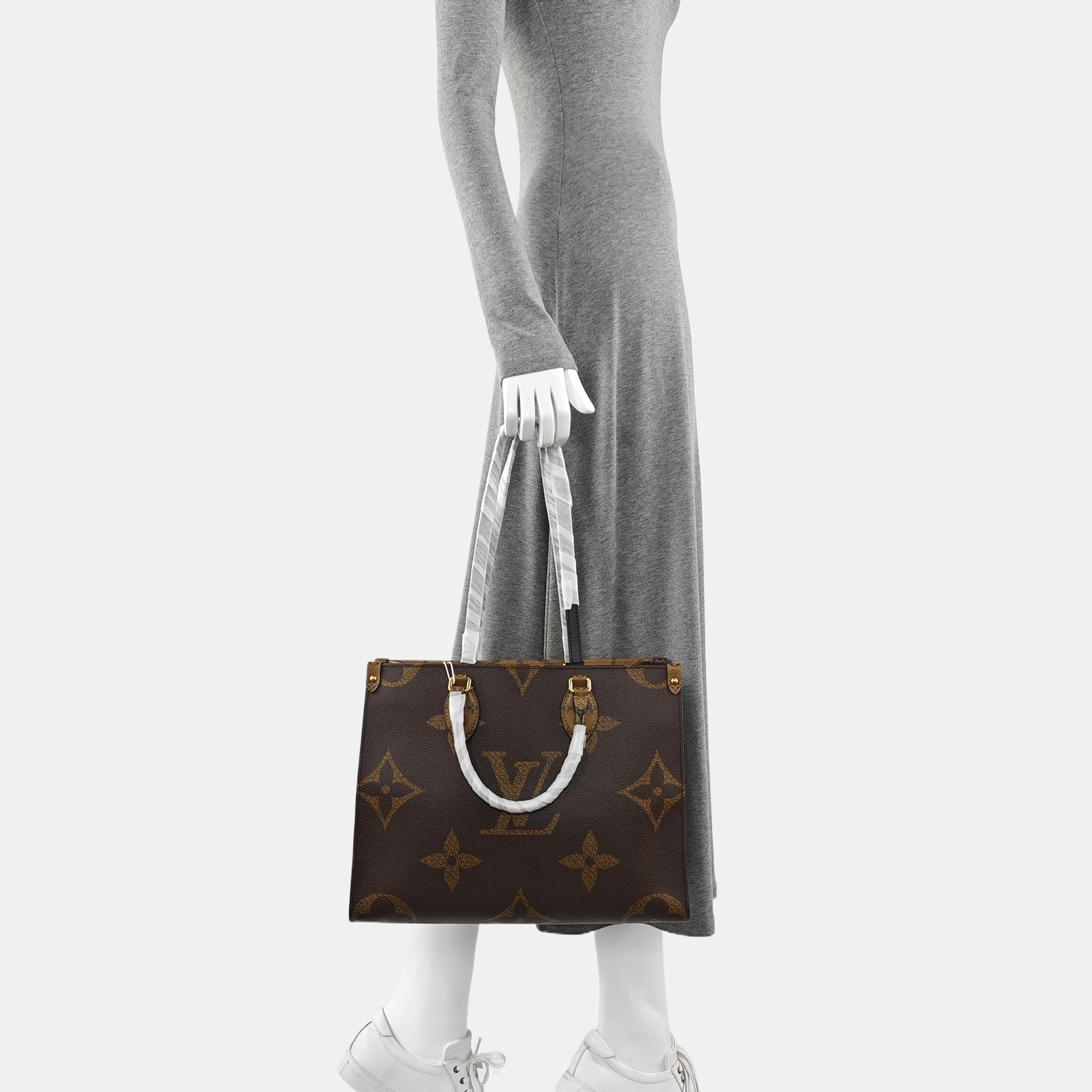 ONTHEGO MM Monogram Coated Canvas Brown