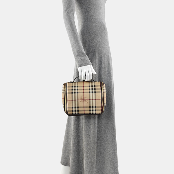 Bolso de lona revestida con asa superior beige