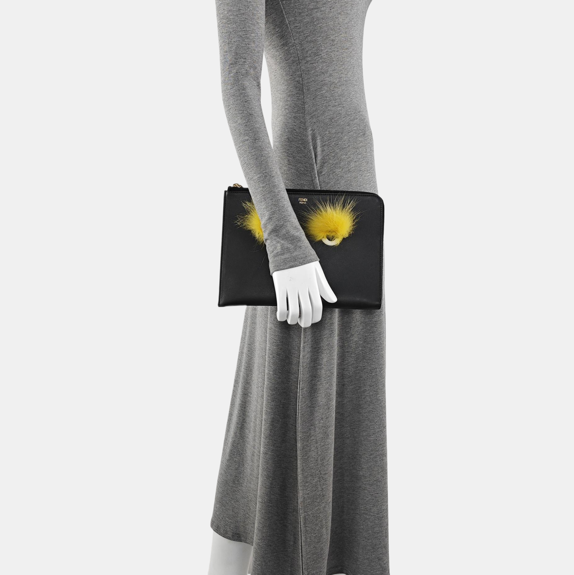 Authenticated pre-owned  Monster Leather Black - Clutch at Looply