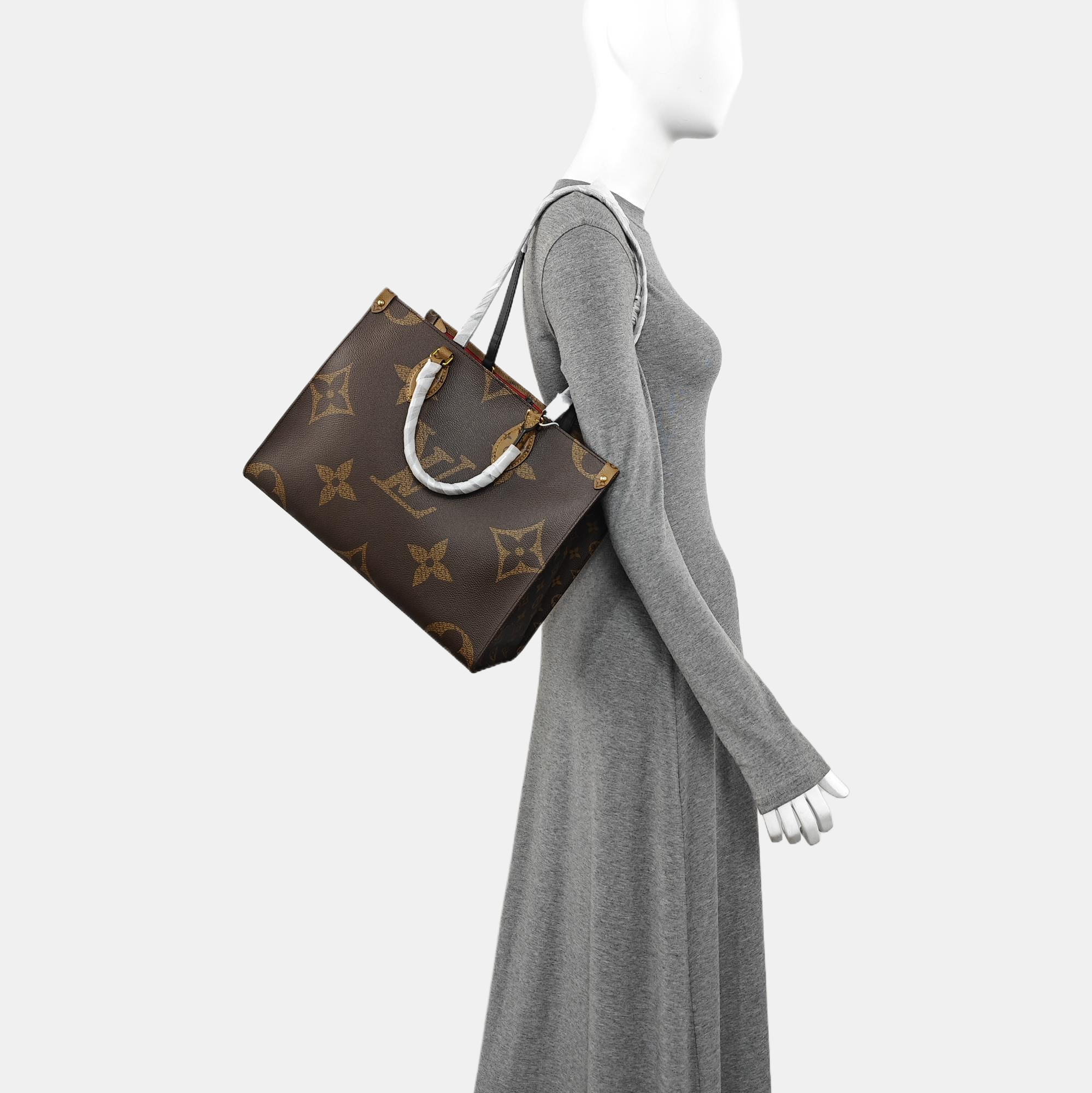 ONTHEGO MM Monogram Coated Canvas Brown