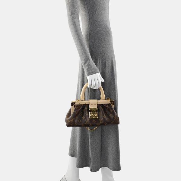 CLUTCH Monogram Coated Canvas Brown
