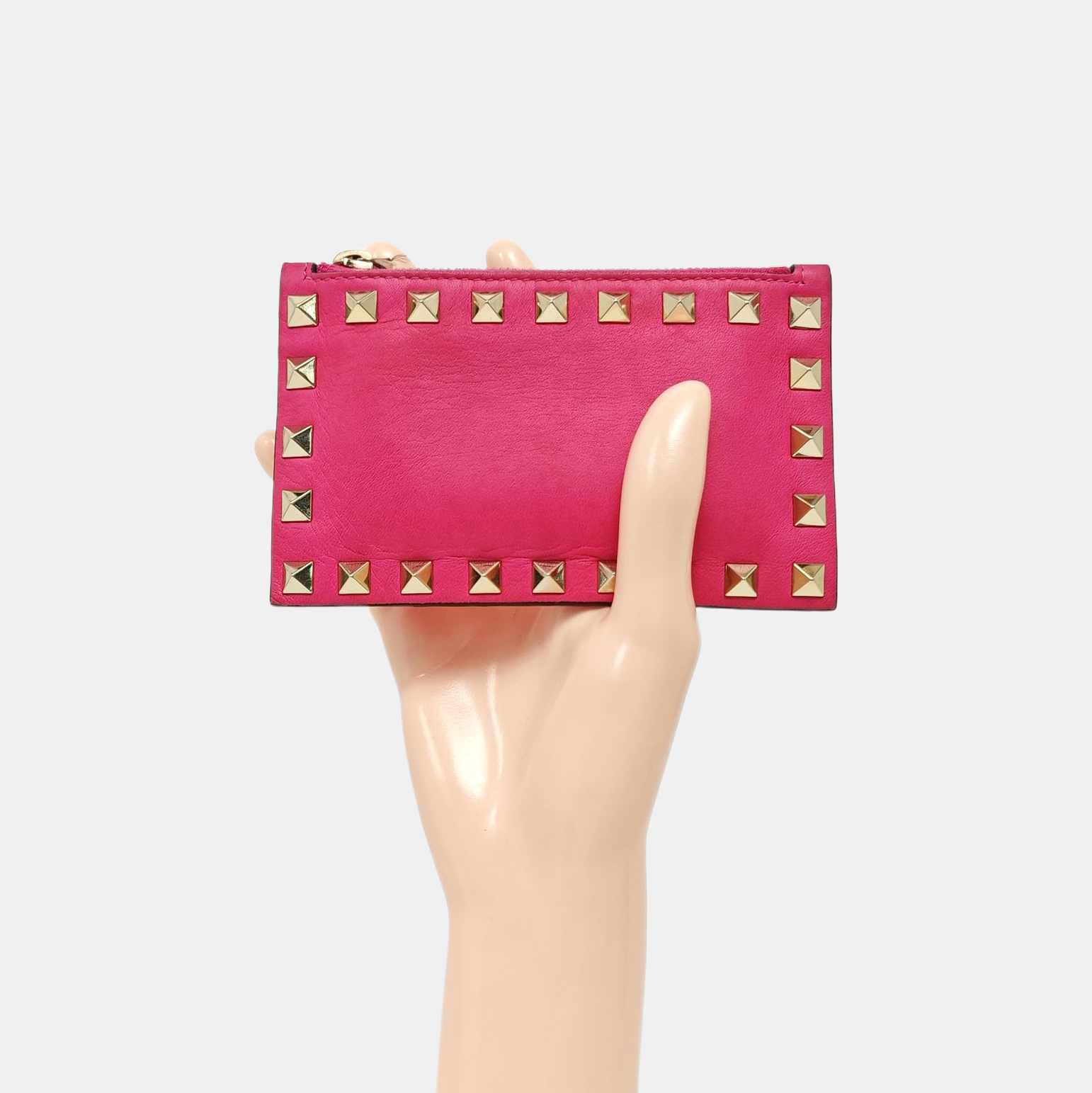 Authenticated pre-owned  Rockstud Calfskin Pink - Clutch at Looply