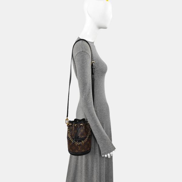 CANOÉ Monogram Coated Canvas Brown