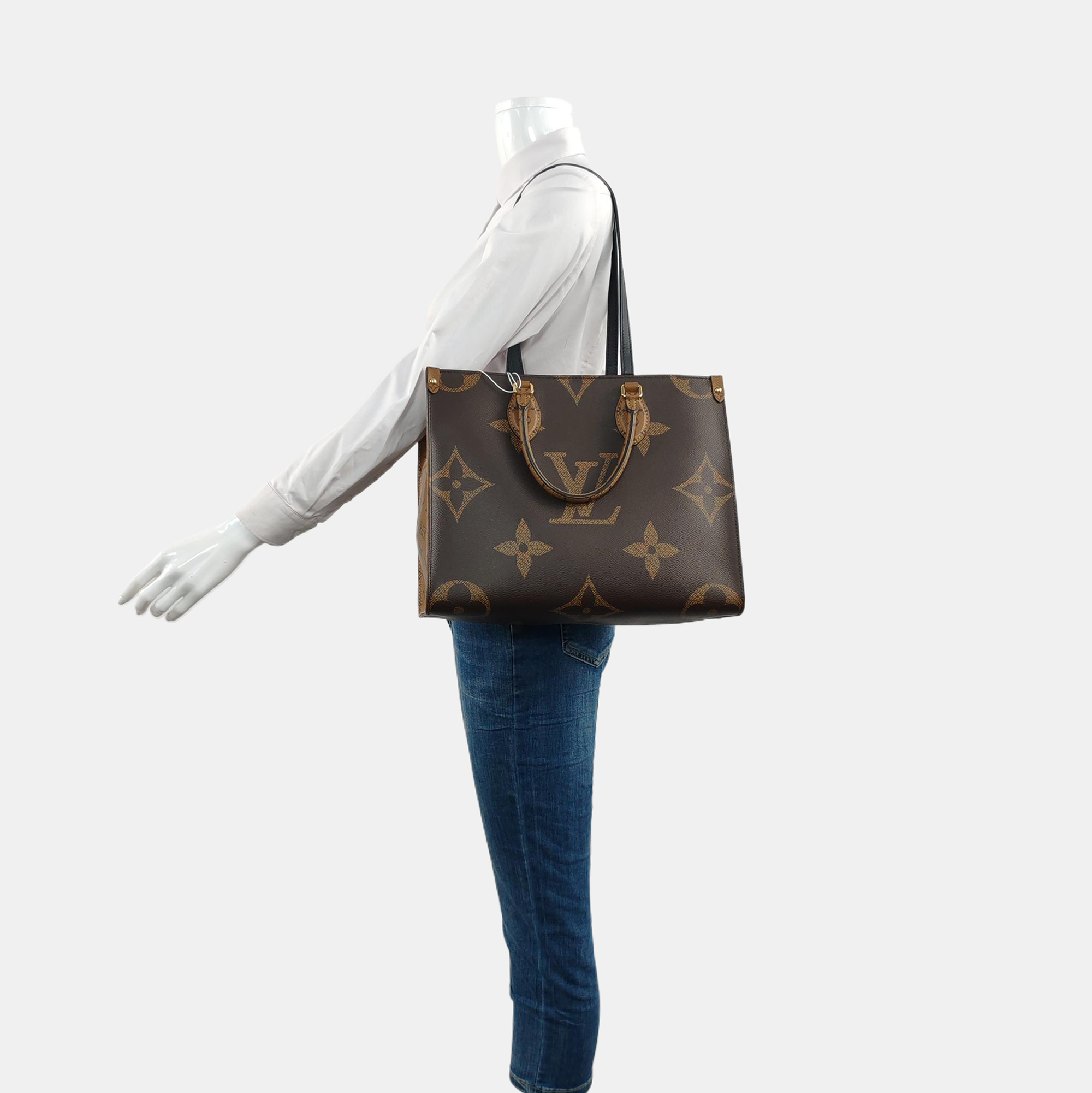 Authenticated pre-owned  ONTHEGO MM Monogram Coated Canvas Brown - Tote Bag at Looply