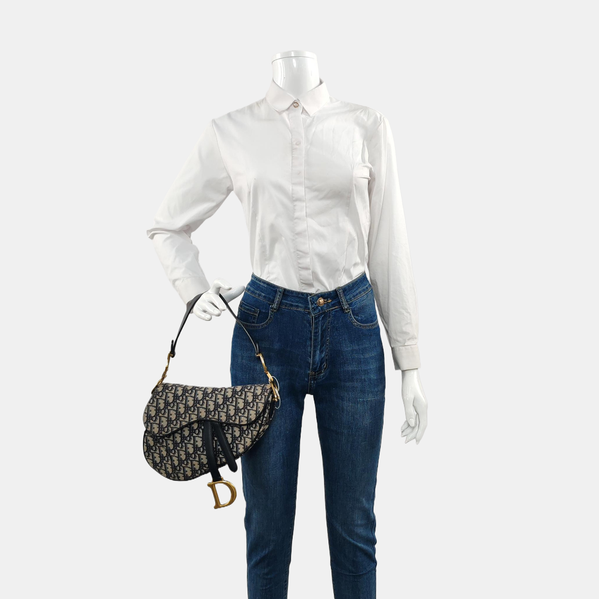 Authenticated pre-owned  Saddle Medium Oblique Canvas Blue - Top Handle Bag at Looply