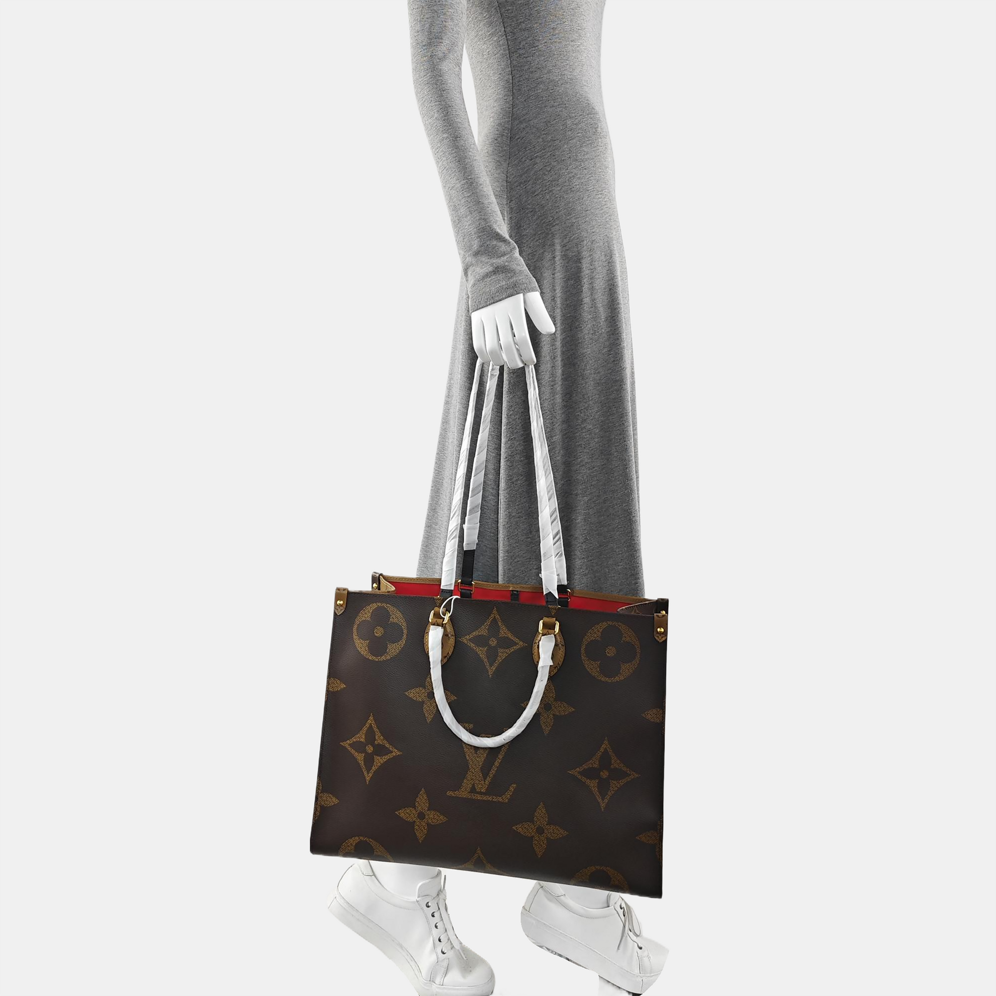 ONTHEGO GM Monogram Coated Canvas Brown
