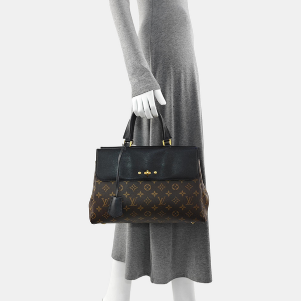 VÉNUS Monogram Coated Canvas Brown