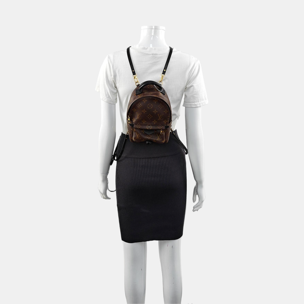 Authenticated pre-owned  PALM SPRINGS Mini Monogram Coated Canvas Brown - Backpack at Looply